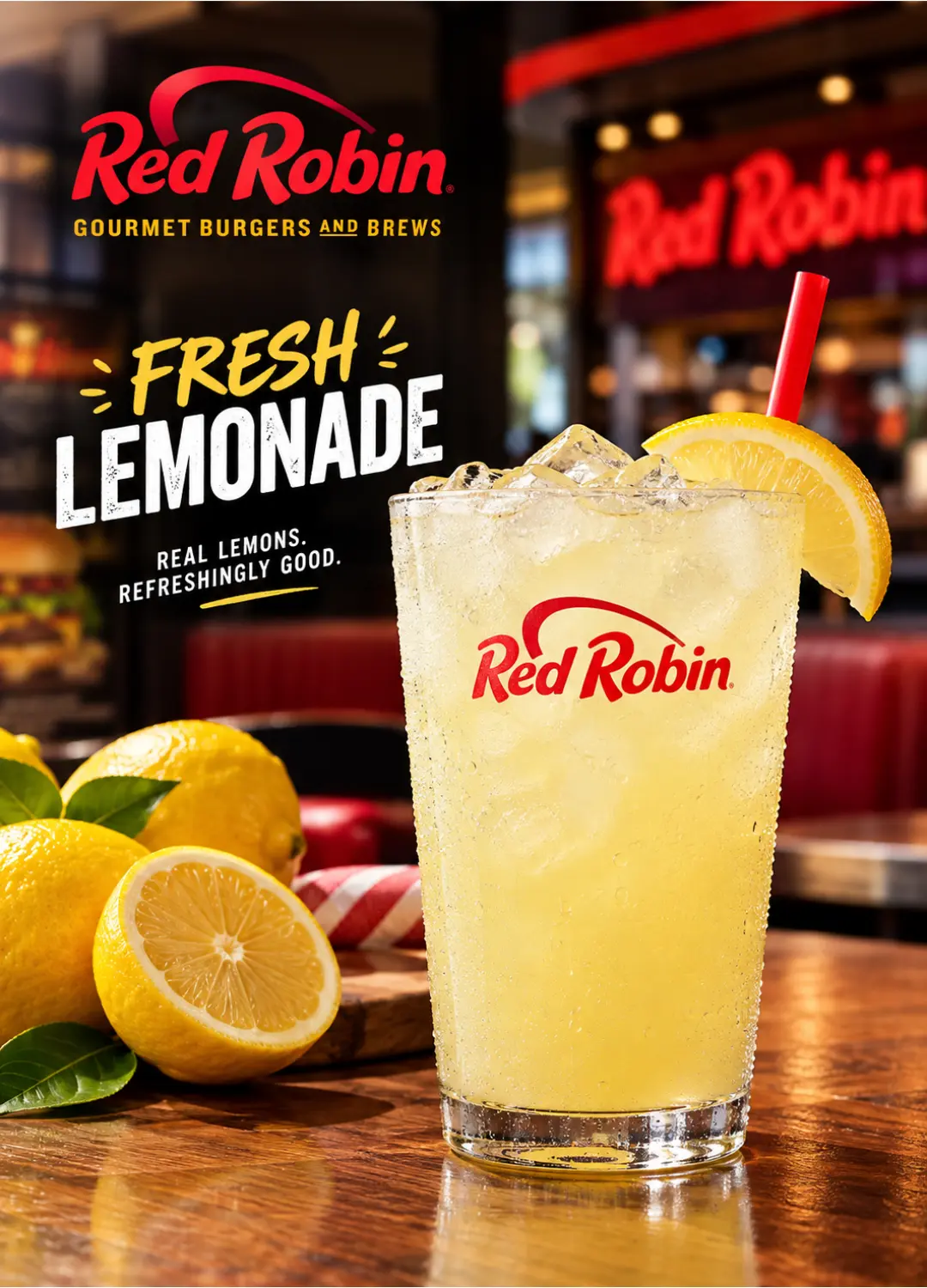 Red Robin Fresh Lemonade in a tall glass with ice and lemon wedge